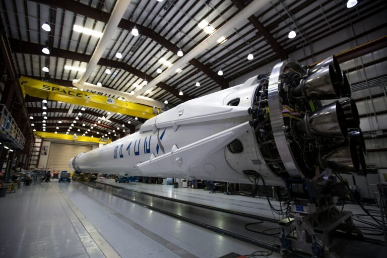 A dramatic SpaceX rocket launch representing the multi-billion dollar SpaceX Buys Cursor technology acquisition.