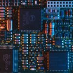 Computer motherboard with high performance DDR5 sticks showing why RAM prices are high
