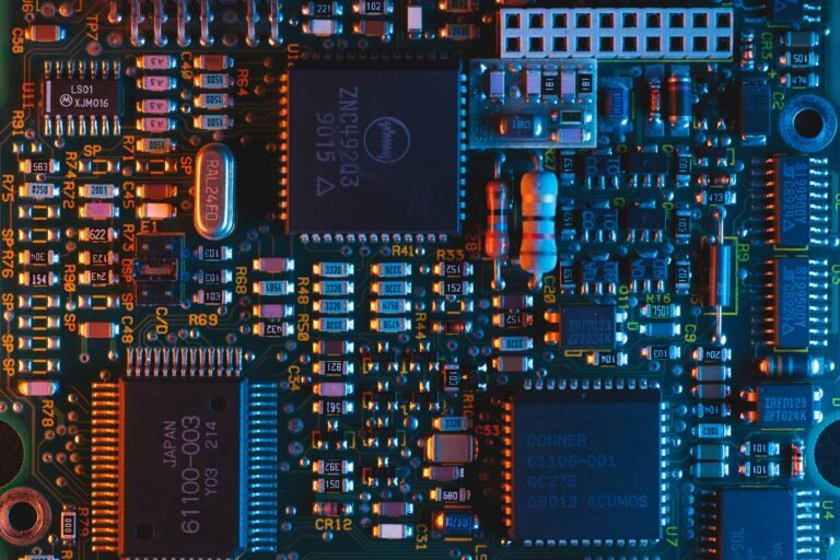 Computer motherboard with high performance DDR5 sticks showing why RAM prices are high